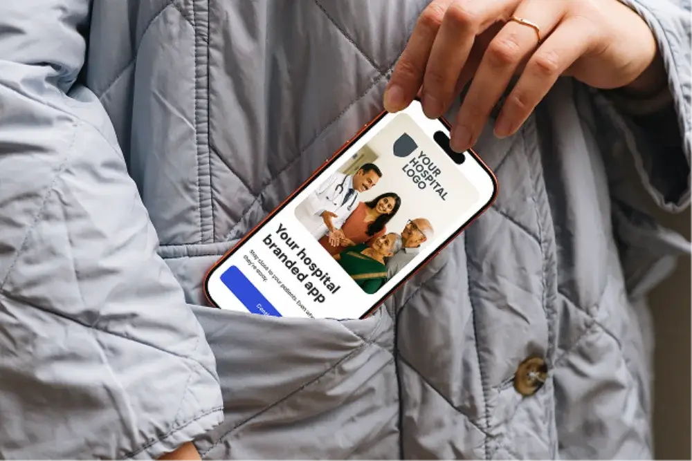 A phone in a jacket pocket showing a hospital's own branded app